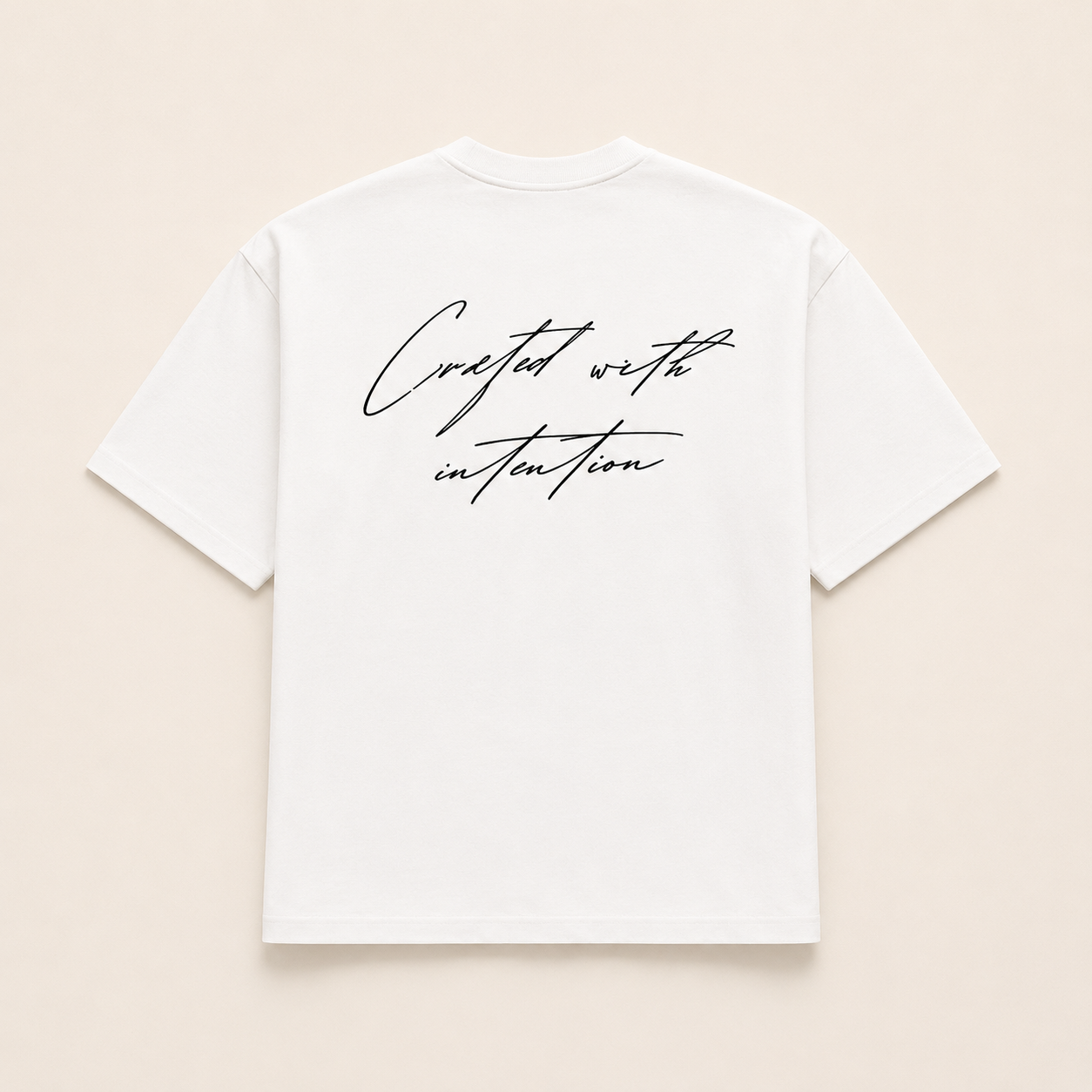 ANIÉZÉ Ascension Tee in Pearl Ivory, back view with Crafted with Intention script