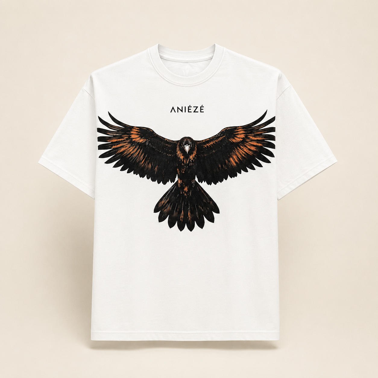 ANIÉZÉ Ascension Tee in Pearl Ivory, front view with black and copper eagle artwork