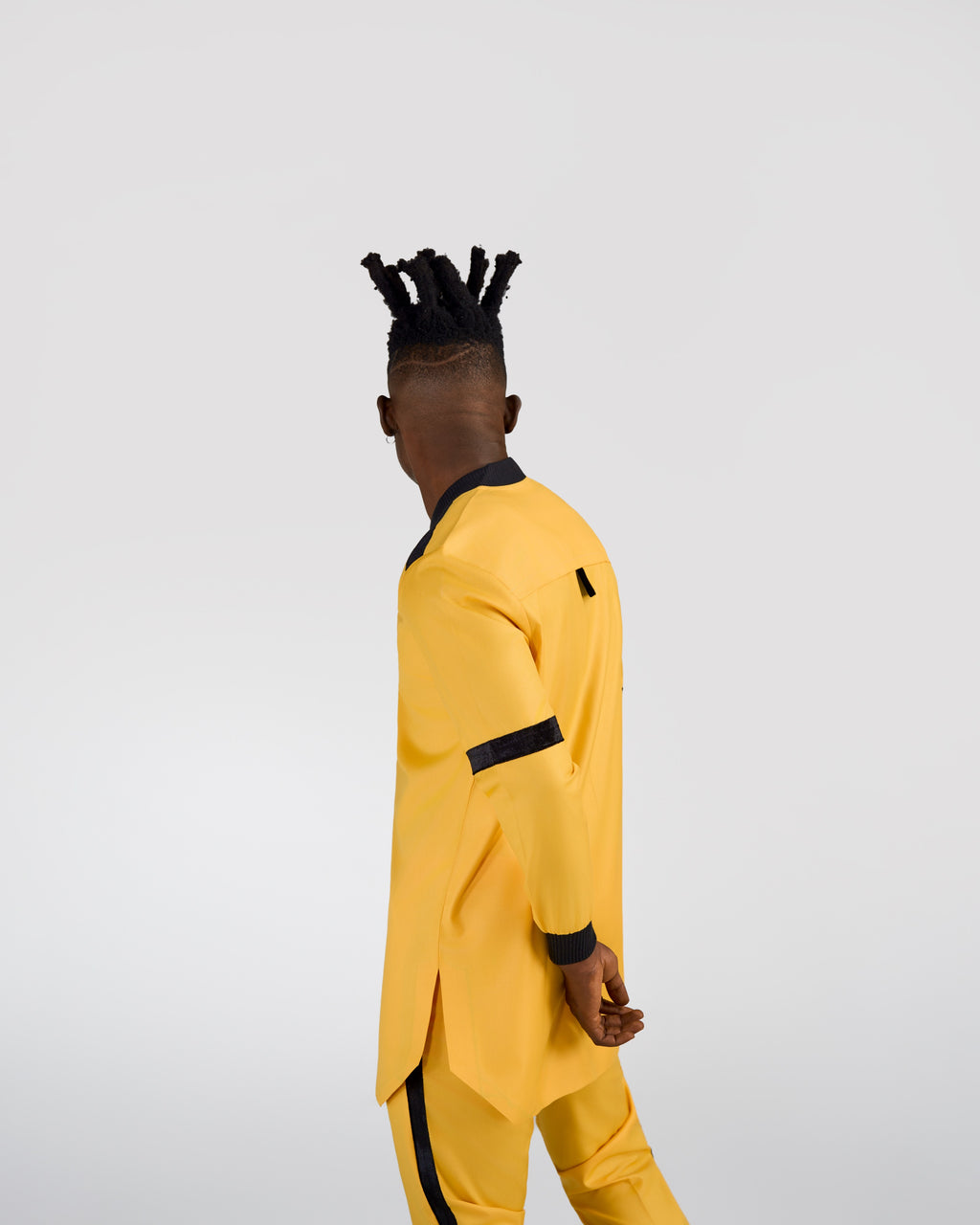 ANIÉZÉ The VarSen Set in Saffron Gold, worn, back view, full body